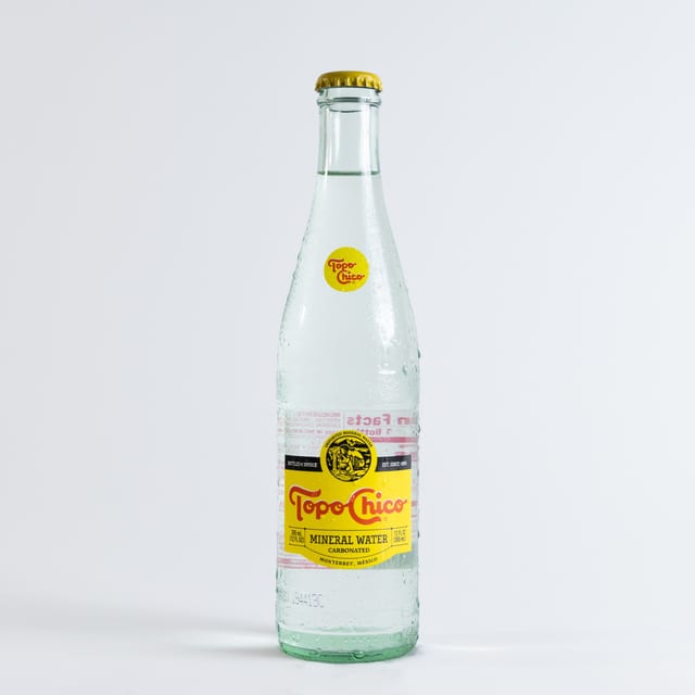 Topo Chico Mineral Water.
